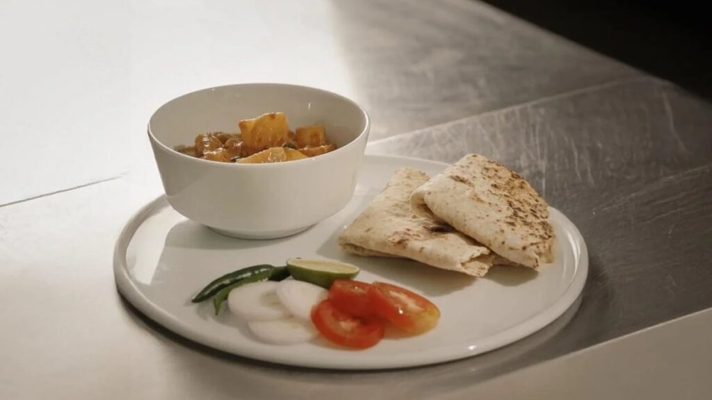 Cassava curry with Maldivian roshi