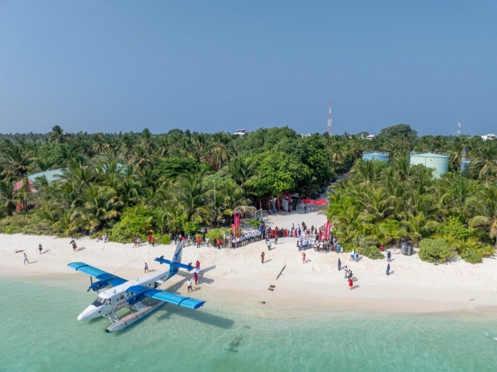 A Maldivian seaplane on the beach on Thoddoo