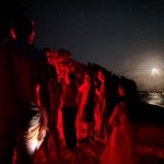 Guests watch green turtles hatch at Niva Kuramathi Maldives