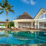 Beach villa with pool at Milaidhoo Maldives