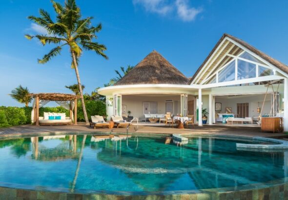 Beach villa with pool at Milaidhoo Maldives